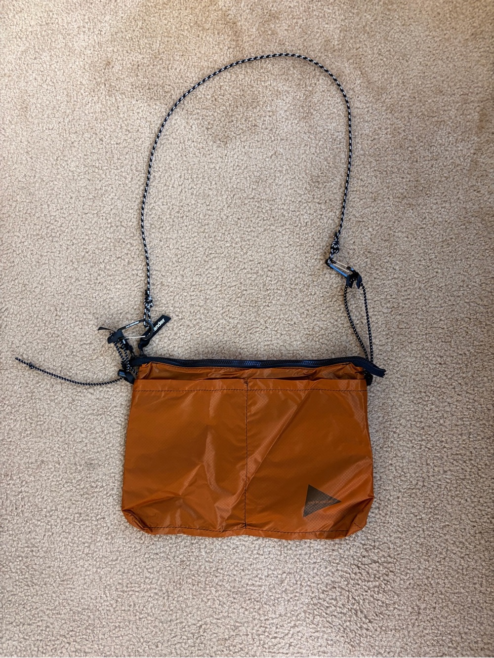And Wander Lightweight Crossbody Bag in Rust Orange